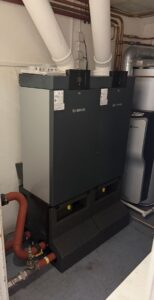 New boilers installed in a hotel basement plant room in Canterbury